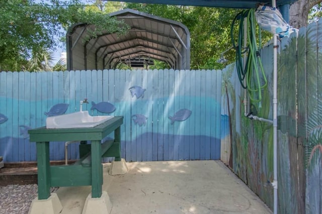 1405 SE 2nd Ave, Steinhatchee, FL 32359 - view of patio featuring a carport