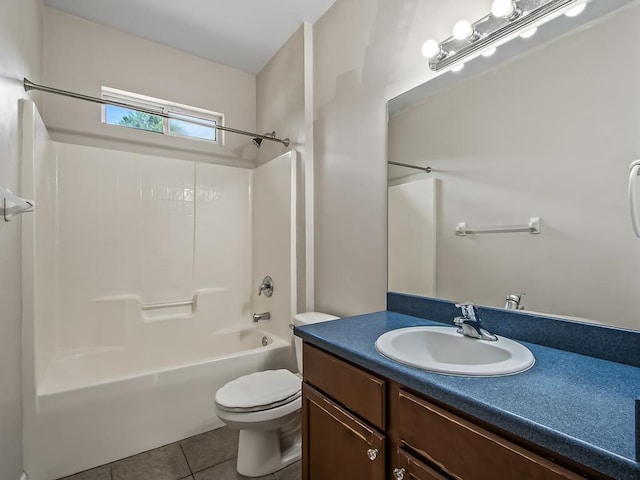 full bathroom with vanity, tile patterned floors, toilet, and shower / bathing tub combination