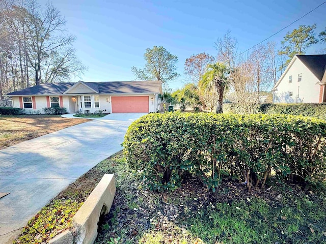 single story home with a garage