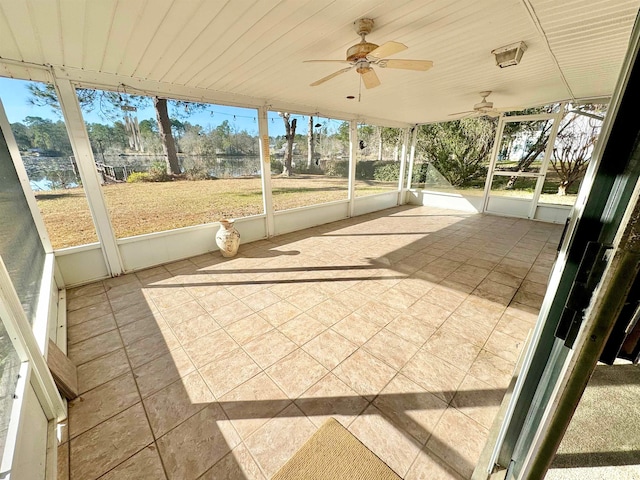 unfurnished sunroom with plenty of natural light