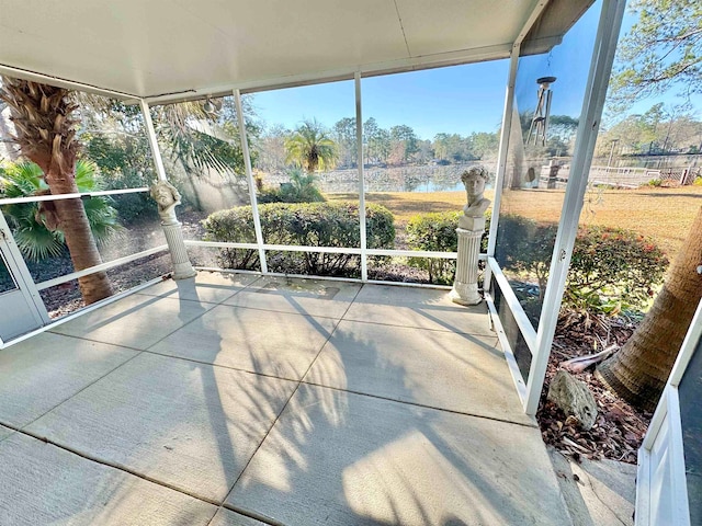 sunroom with a water view