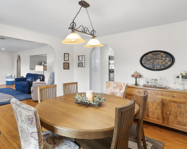 dining room with light wood-type flooring