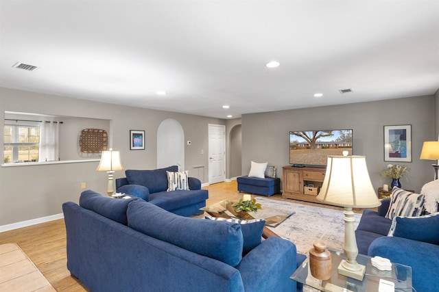 living room with wood-type flooring