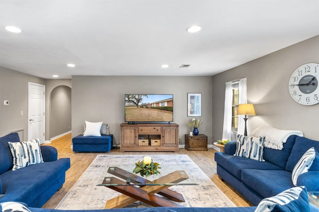 living room with light hardwood / wood-style floors