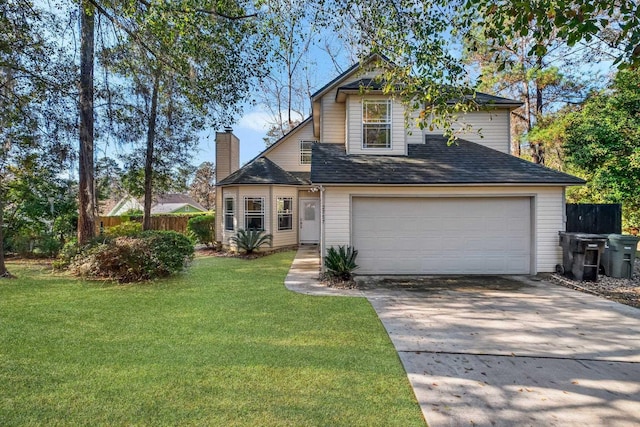 front of property with a garage and a front lawn