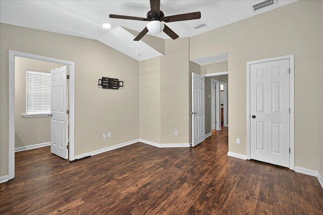3974 Paeonia Ct, Tallahassee, FL 32305 - unfurnished bedroom with dark wood-style flooring, vaulted ceiling, baseboards, and a ceiling fan