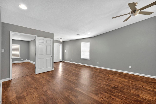 3974 Paeonia Ct, Tallahassee, FL 32305 - spare room with a ceiling fan, dark wood-style floors, baseboards, recessed lighting, and a textured ceiling