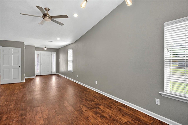 3974 Paeonia Ct, Tallahassee, FL 32305 - unfurnished room with healthy amount of natural light, a ceiling fan, dark wood finished floors, and lofted ceiling