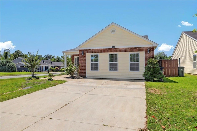 3974 Paeonia Ct, Tallahassee, FL 32305 - view of front of house with driveway and brick siding