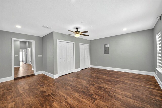 3974 Paeonia Ct, Tallahassee, FL 32305 - unfurnished bedroom with two closets, dark wood-style flooring, baseboards, and recessed lighting