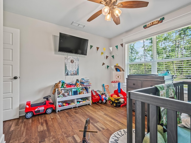 103 Pan Cera Dr, Crawfordville, FL 32327 - bedroom with wood finished floors and a ceiling fan