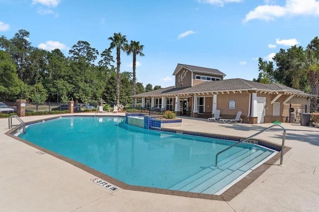 view of swimming pool featuring a patio