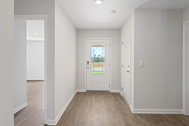 doorway featuring light hardwood / wood-style flooring