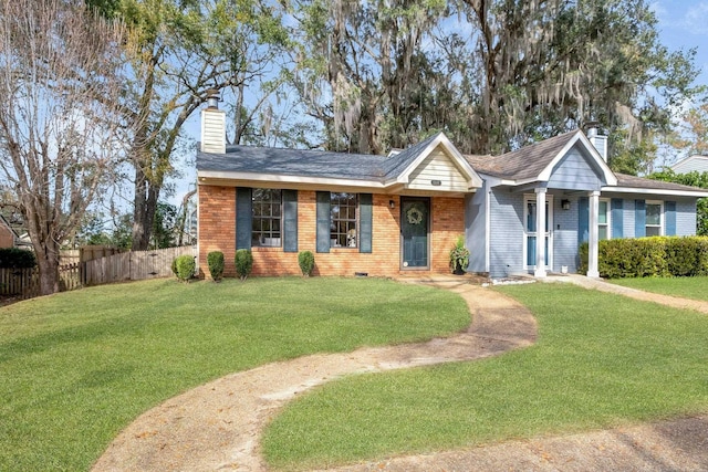 ranch-style house with a front lawn