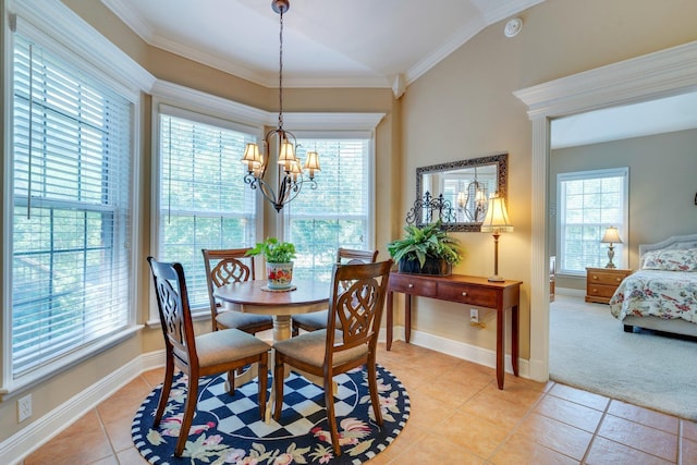 2605 Antietam Trl, Tallahassee, FL 32312 - dining area featuring a chandelier, healthy amount of natural light, light tile patterned flooring, crown molding, and lofted ceiling
