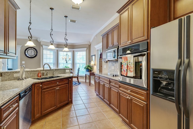 2605 Antietam Trl, Tallahassee, FL 32312 - kitchen with appliances with stainless steel finishes, a sink, ornamental molding, backsplash, and light tile patterned floors