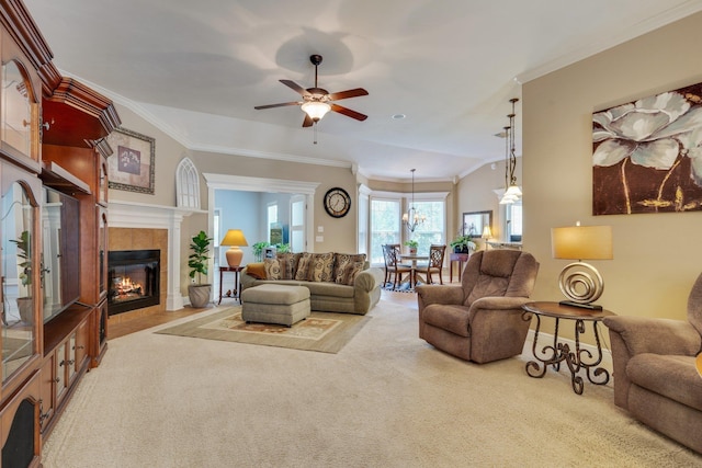2605 Antietam Trl, Tallahassee, FL 32312 - living room with carpet, crown molding, ceiling fan, and a tiled fireplace