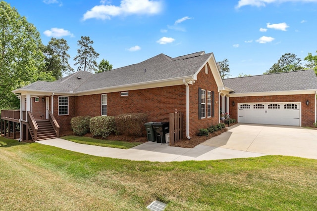 2605 Antietam Trl, Tallahassee, FL 32312 - view of property exterior featuring brick siding, a garage, driveway, and a lawn