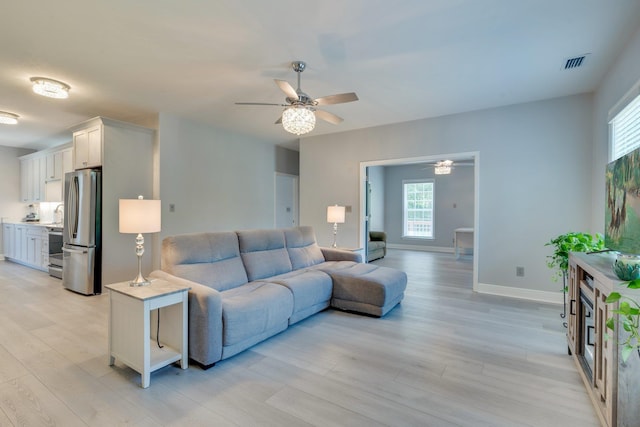 2605 Antietam Trl, Tallahassee, FL 32312 - living room featuring plenty of natural light, ceiling fan, and light wood-type flooring