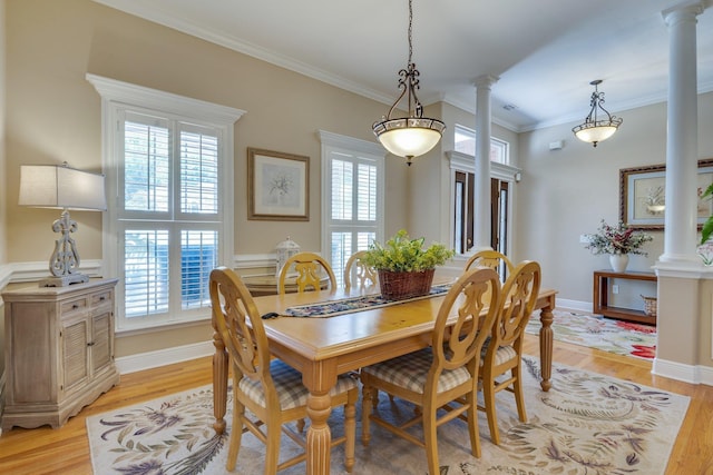 2605 Antietam Trl, Tallahassee, FL 32312 - dining space with decorative columns, crown molding, light wood-type flooring, and baseboards