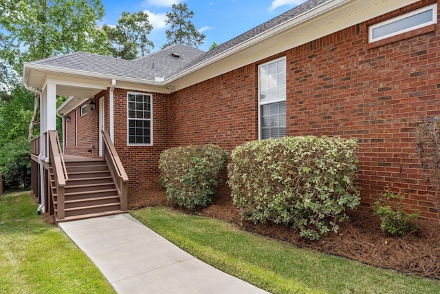 2605 Antietam Trl, Tallahassee, FL 32312 - view of front of property featuring brick siding, a shingled roof, and a front lawn