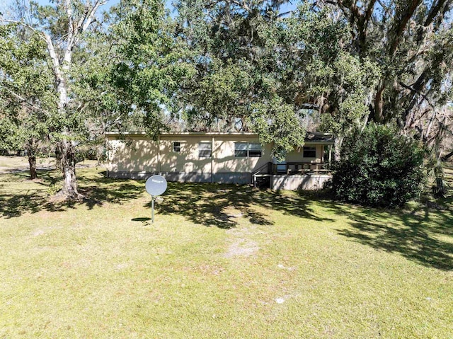 view of yard featuring a deck