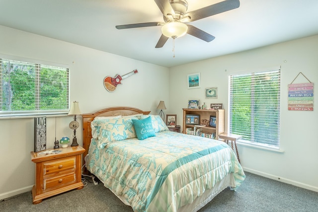 627 Mariner Cir, Alligator Point, FL 32346 - bedroom featuring multiple windows, carpet, and baseboards