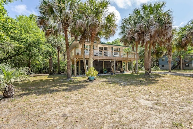 627 Mariner Cir, Alligator Point, FL 32346 - back of house featuring a deck