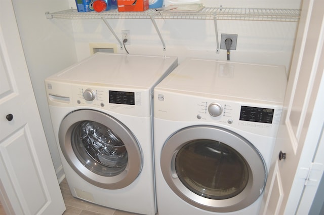 laundry area featuring washing machine and dryer