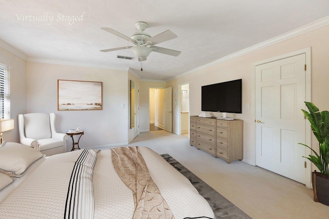 bedroom with ornamental molding, a ceiling fan, visible vents, and light colored carpet