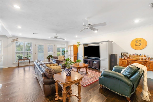 living room featuring recessed lighting, a healthy amount of sunlight, and wood finished floors