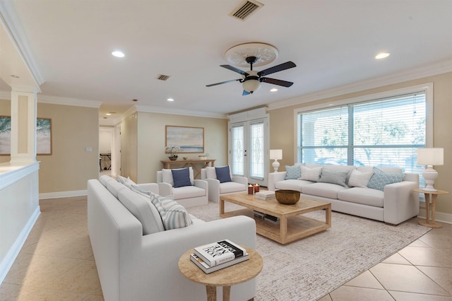 tiled living room featuring ceiling fan and ornamental molding