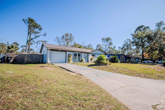 ranch-style home with a front lawn and a garage