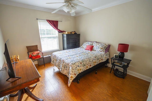 3204 Gallant Fox Trl, Tallahassee, FL 32309 - bedroom with crown molding, wood finished floors, baseboards, and a ceiling fan