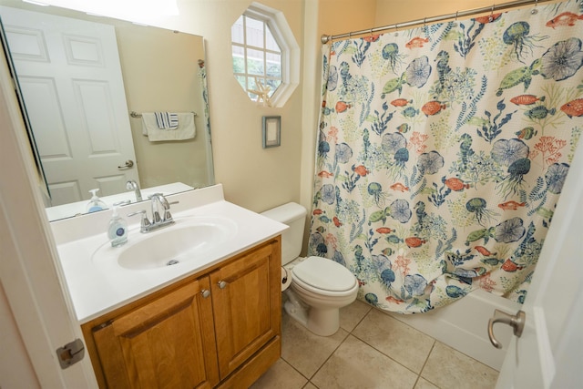 3204 Gallant Fox Trl, Tallahassee, FL 32309 - bathroom featuring tile patterned flooring, toilet, vanity, and shower / bath combo with shower curtain