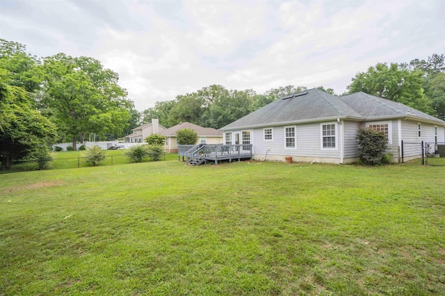 3204 Gallant Fox Trl, Tallahassee, FL 32309 - rear view of house featuring a deck and roof with shingles