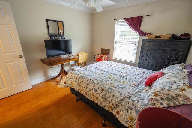 3204 Gallant Fox Trl, Tallahassee, FL 32309 - bedroom featuring light wood-style floors, crown molding, and baseboards