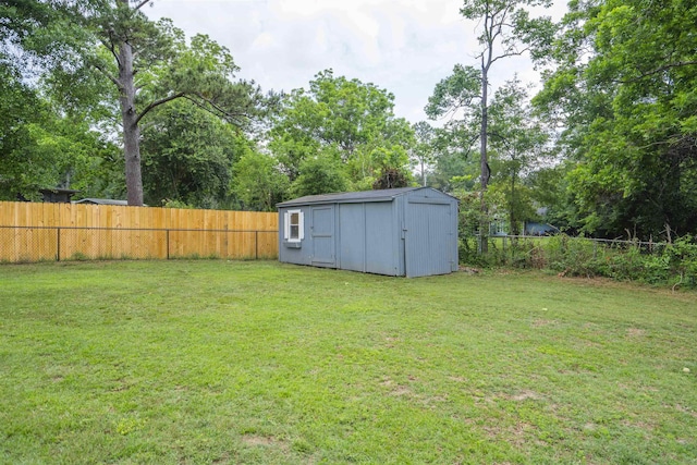 3204 Gallant Fox Trl, Tallahassee, FL 32309 - view of yard featuring a storage unit, an outdoor structure, and view of scattered trees