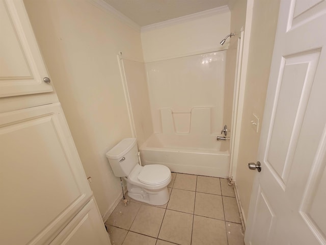 bathroom with tile patterned flooring, toilet, ornamental molding, and shower / tub combination