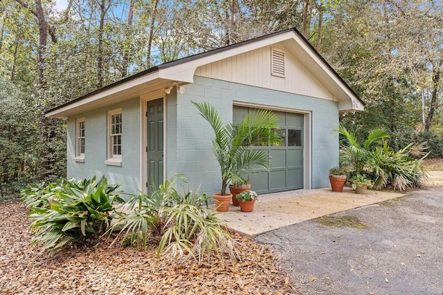 view of outbuilding with a garage