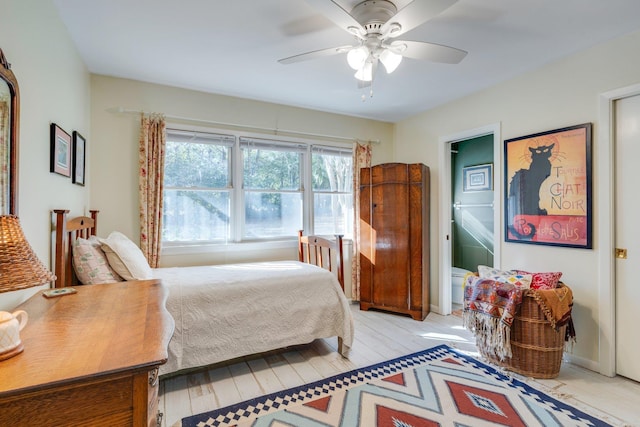 bedroom with ceiling fan and light wood-type flooring