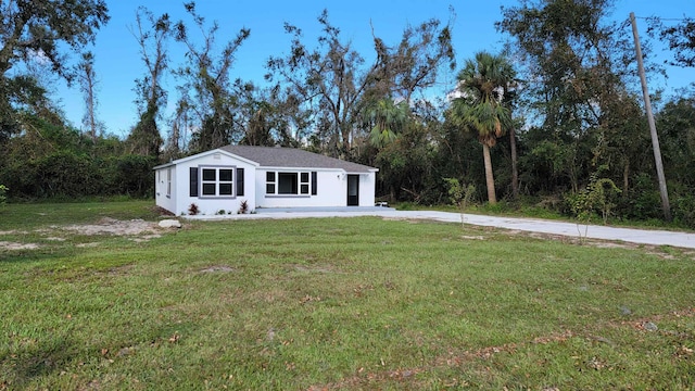 view of front of home with a front yard