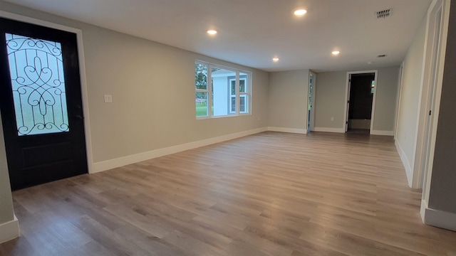 foyer with light wood-type flooring