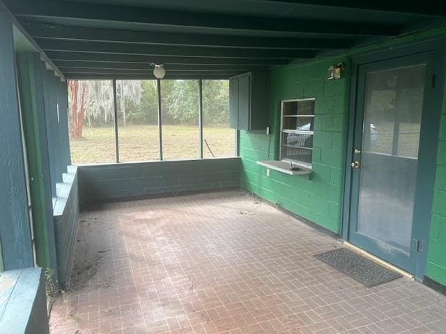 view of unfurnished sunroom