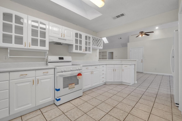 kitchen featuring ceiling fan, white appliances, light tile patterned flooring, a textured ceiling, and white cabinets