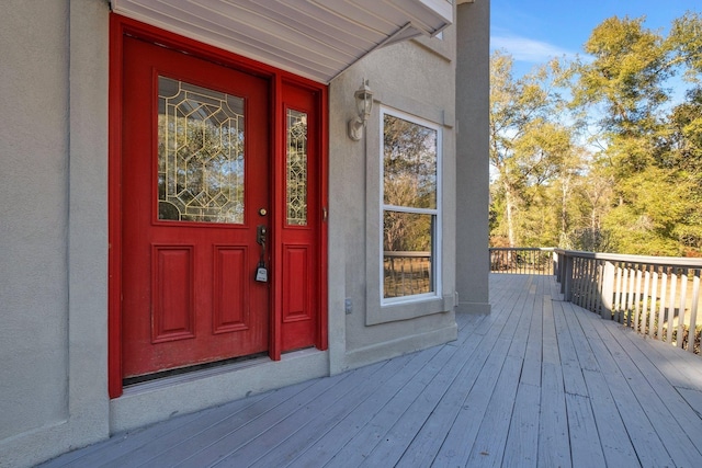 doorway to property with a deck