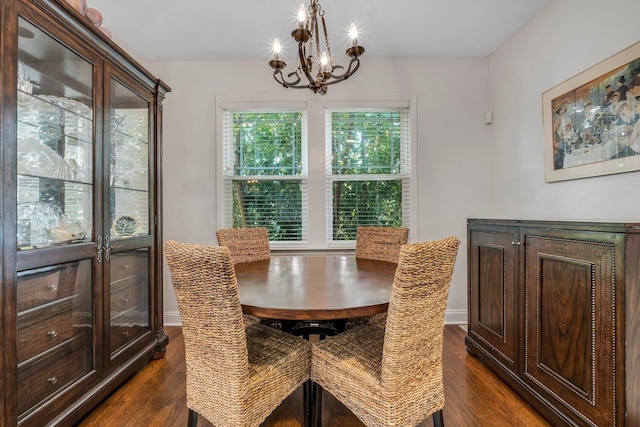 3260 Coneflower Dr, Tallahassee, FL 32311 - dining space featuring dark wood-style floors and a chandelier