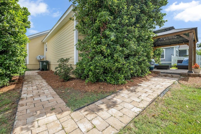 3260 Coneflower Dr, Tallahassee, FL 32311 - view of side of home featuring a gazebo and a patio