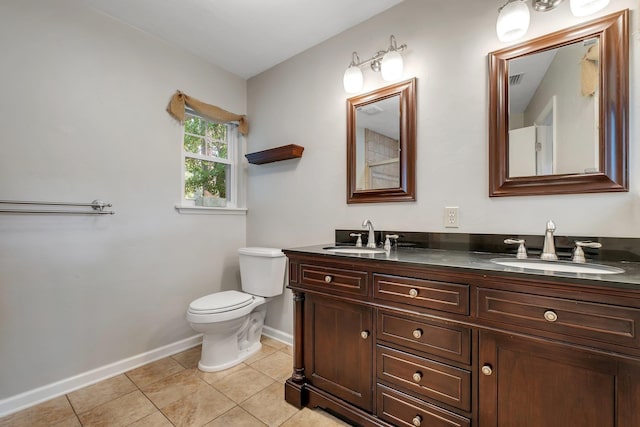 6557 Alan A Dale Trl, Leon, FL 32309 - full bath with baseboards, double vanity, toilet, and tile patterned floors