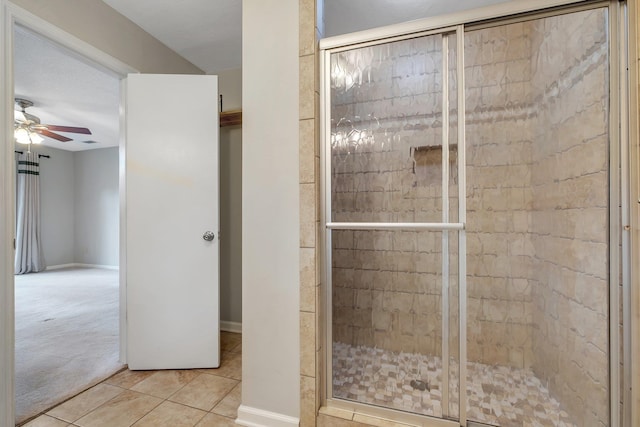 6557 Alan A Dale Trl, Leon, FL 32309 - bathroom featuring a shower stall, a ceiling fan, tile patterned floors, and baseboards